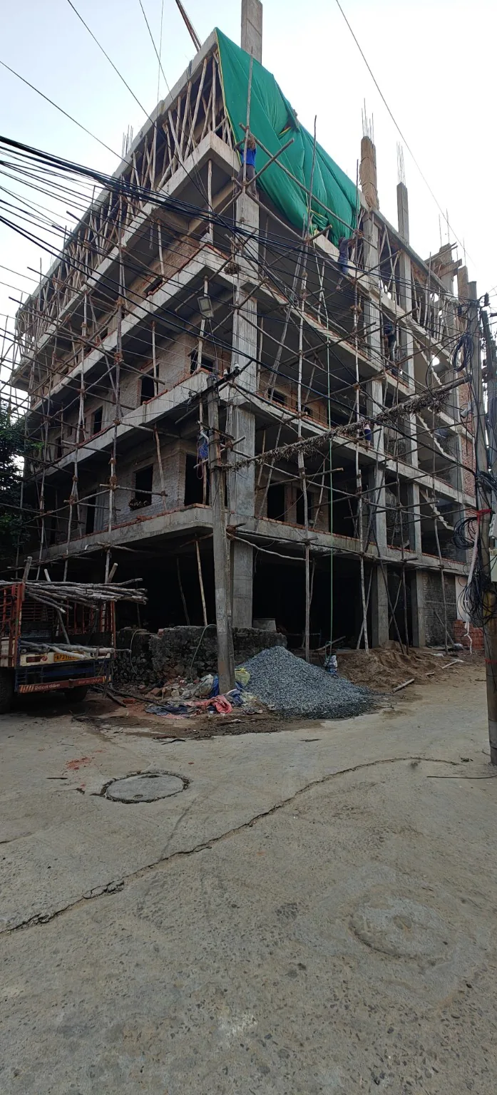 Photograph of the AS HOSTEL building during construction